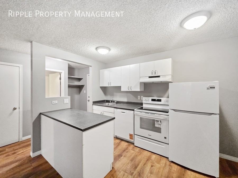 1337 13 Ave Sw #102 - Photo 2 of 14