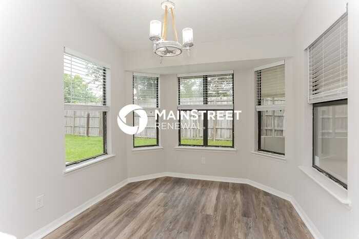 8891 Ivymill Pl N - Photo 6 of 16