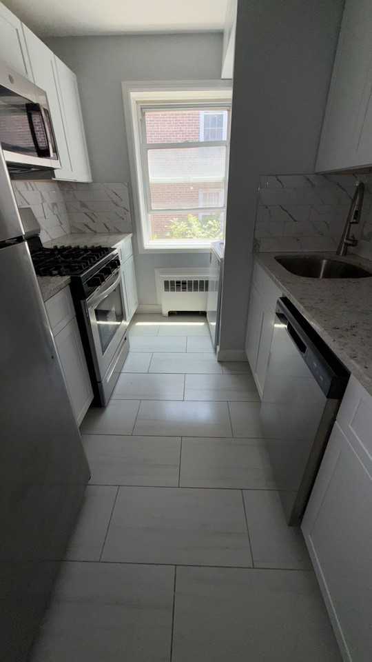 56-Village Court Apartments, LLC - Photo 2 of 14