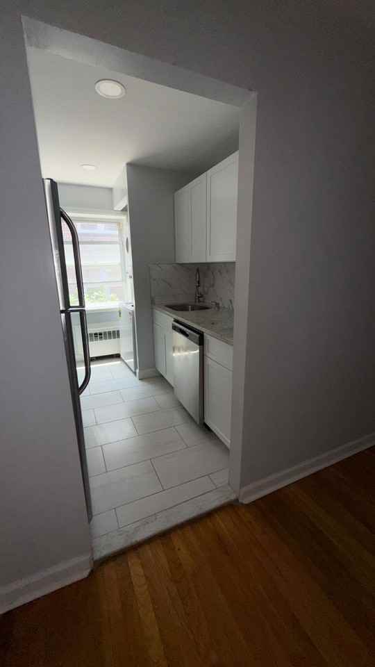 56-Village Court Apartments, LLC - Photo 6 of 14