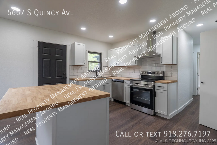 5667 S Quincy Ave - Photo 5 of 30