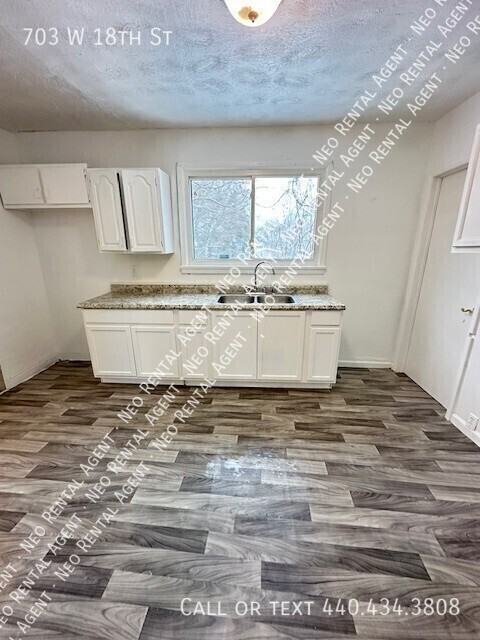 703 W 18th St - Photo 6 of 9