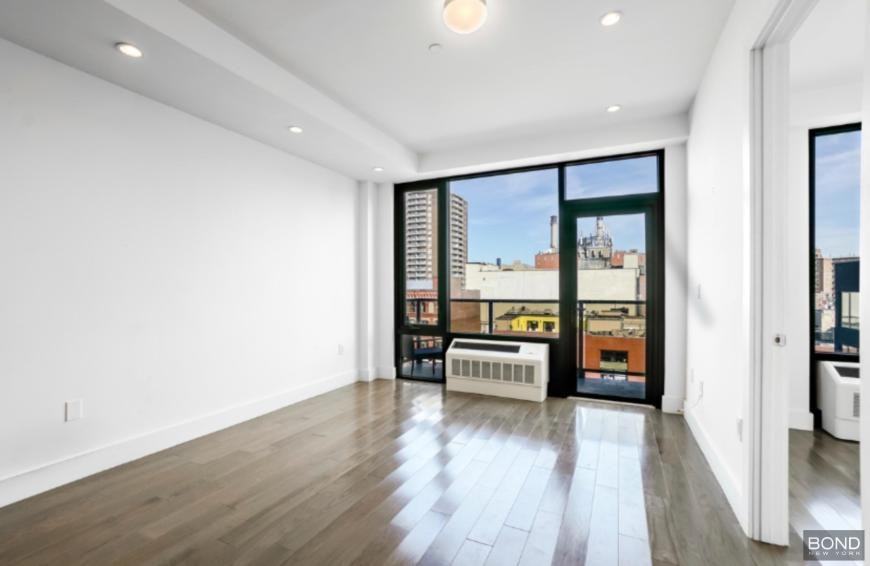 399 E 8th St - Photo 2 of 5