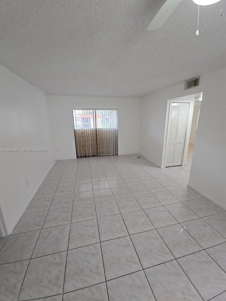 9718 Hammocks Blvd #202-35 - Photo 3 of 15