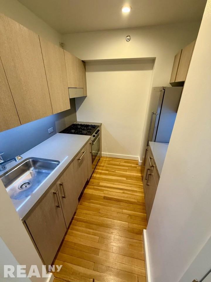 W 15th St #225 - Photo 3 of 7