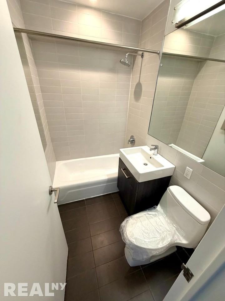 W 15th St #225 - Photo 7 of 7