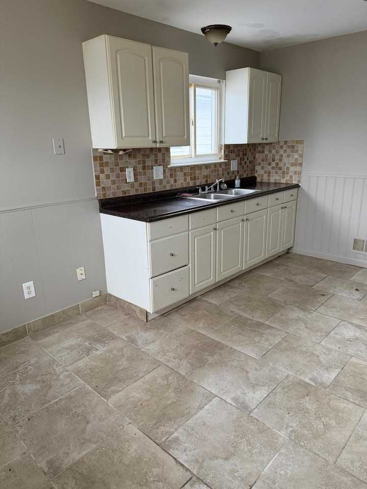 2399 Emmons Ave - Photo 3 of 10