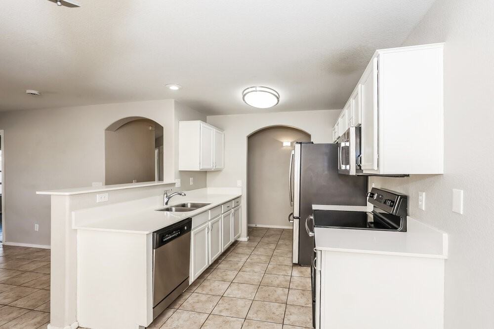 1901 N 129th Ave - Photo 6 of 16