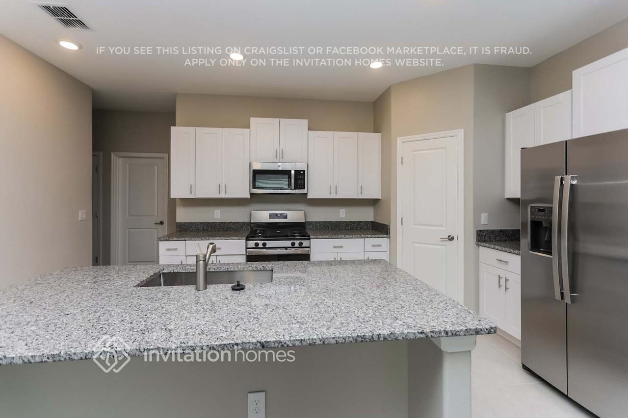 8638 41st Ave E - Photo 5 of 17