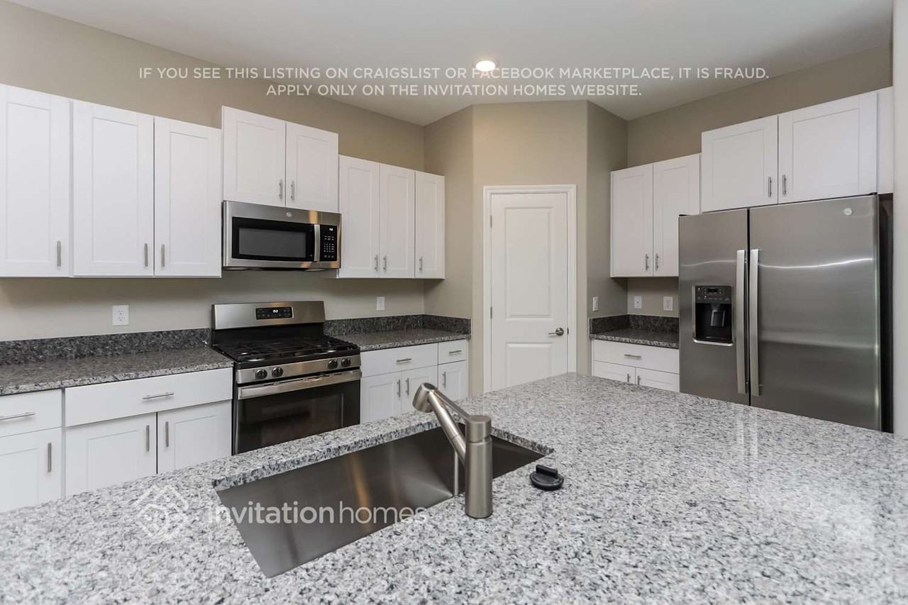 8638 41st Ave E - Photo 6 of 17