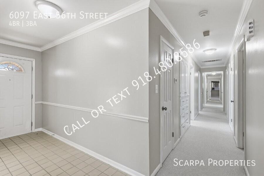 6097 E 56th St - Photo 4 of 42