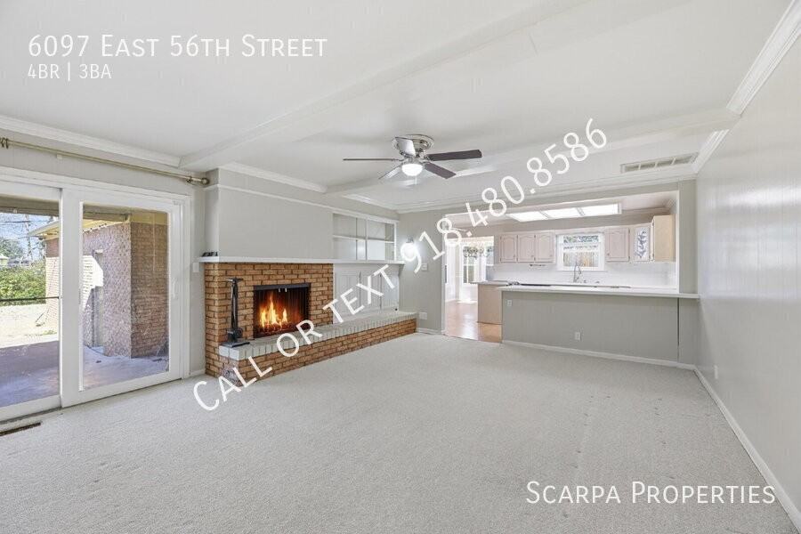 6097 E 56th St - Photo 5 of 42