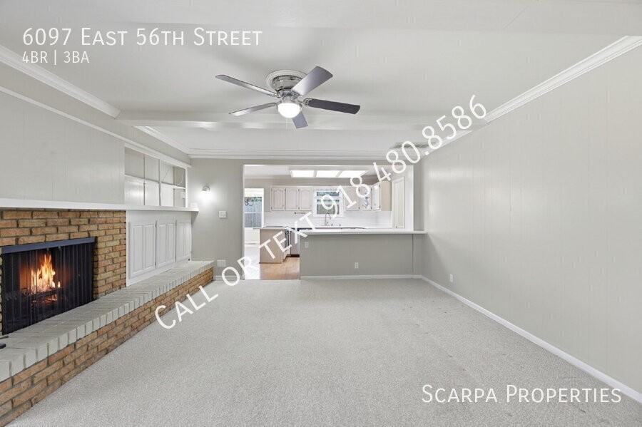 6097 E 56th St - Photo 6 of 42