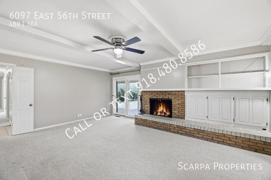 6097 E 56th St - Photo 7 of 42