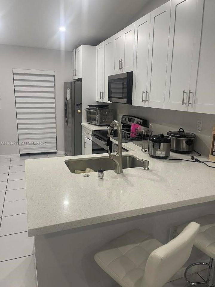 15420 Sw 74th Circle Ct #203-2 - Photo 4 of 9