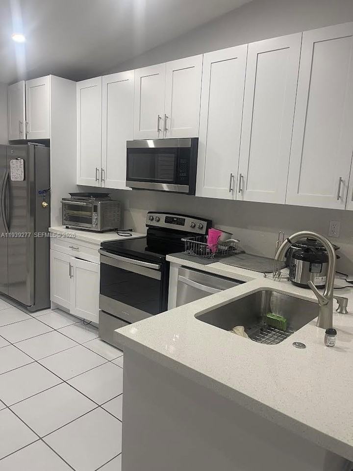 15420 Sw 74th Circle Ct #203-2 - Photo 5 of 9