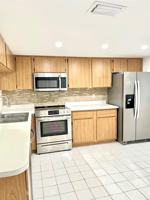 featured image of 1005 Palm Beach Trace Dr #1005