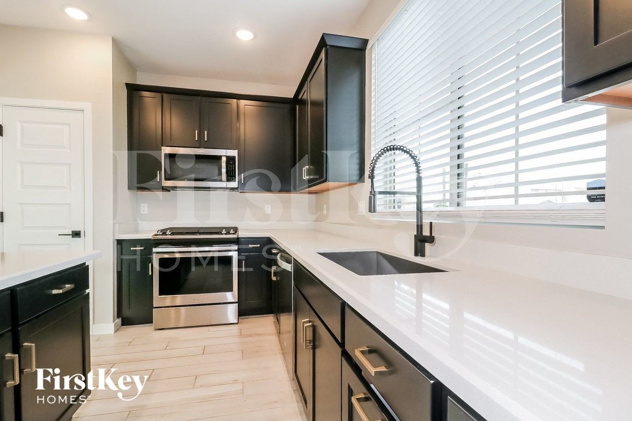 1852 N 208th Ave - Photo 6 of 15