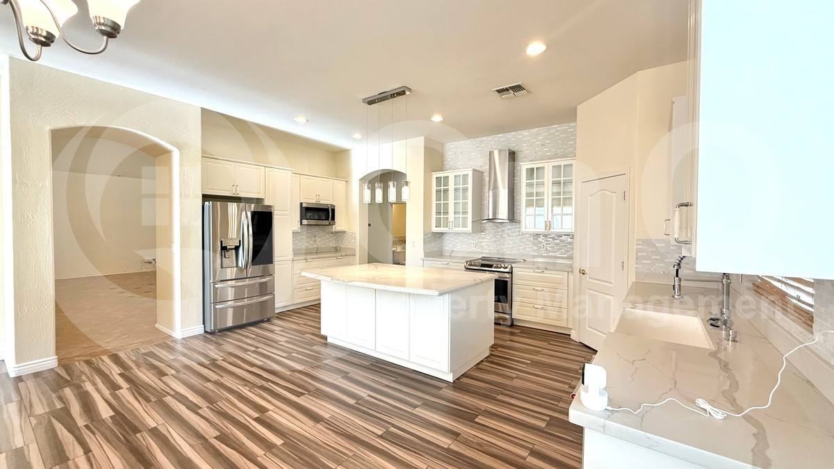 6320 S Black Hills Way - Photo 3 of 10