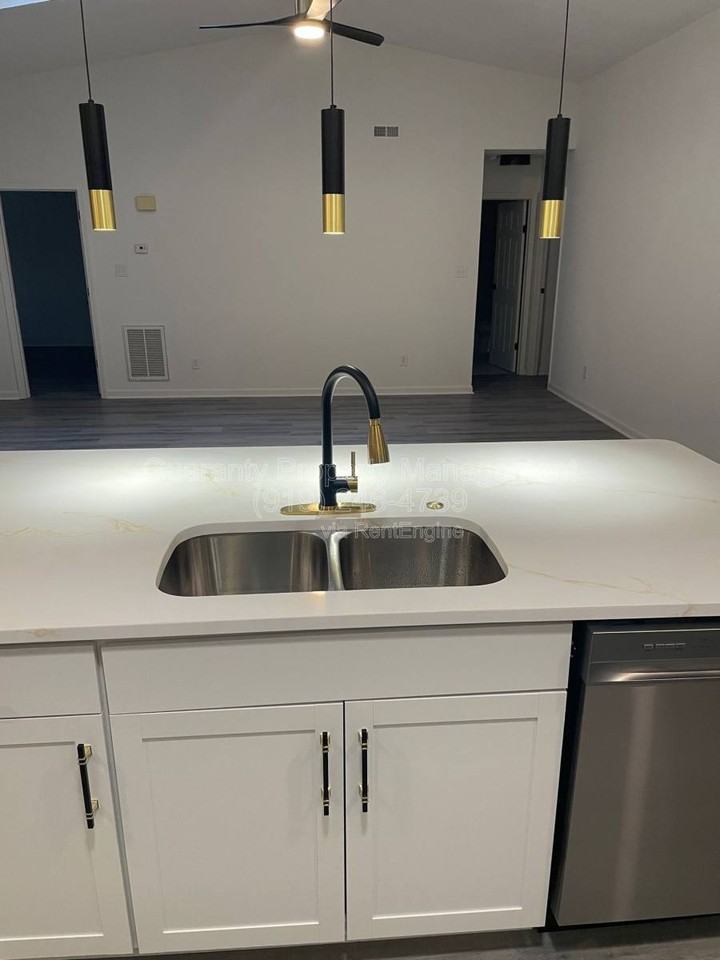 8029 Mcguire Dr - Photo 3 of 10