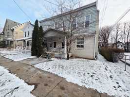 featured image of 166 W River St