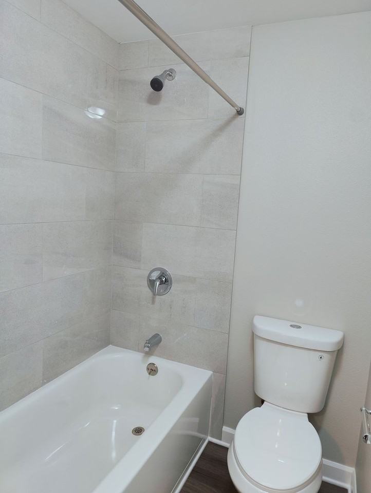 MAC CITY APARTMENTS - Photo 4 of 14