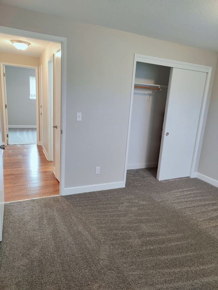 MAC CITY APARTMENTS - Photo 5 of 14