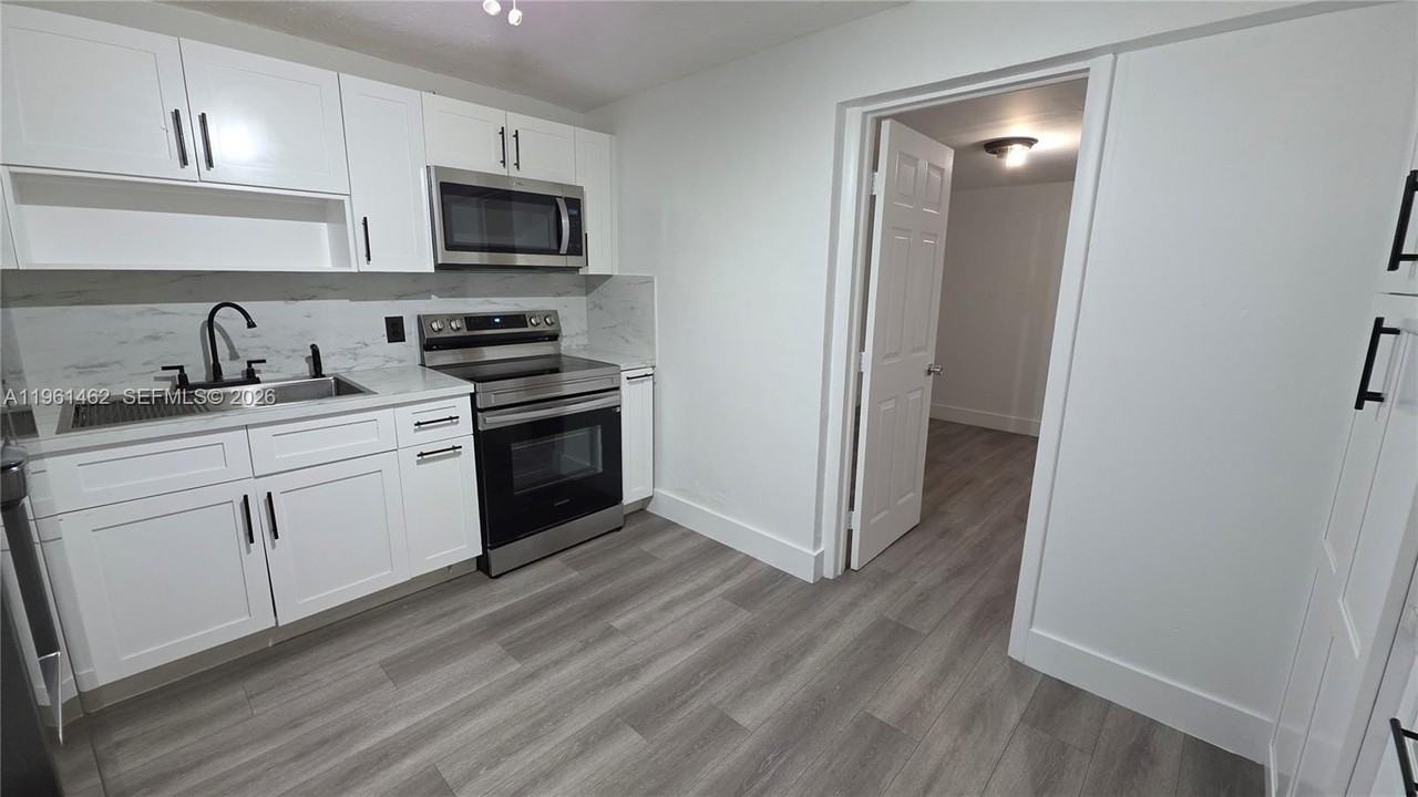 6616 Raleigh St #1 - Photo 4 of 37