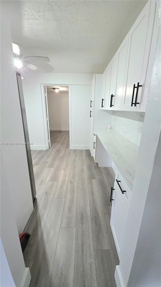 6616 Raleigh St #1 - Photo 6 of 37