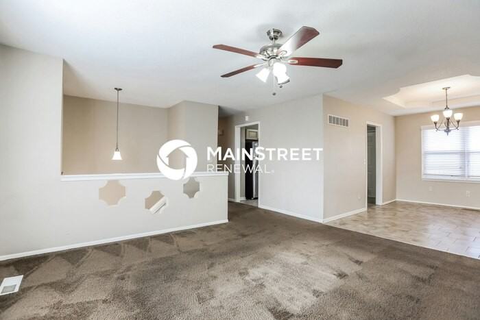 406 E 164th Ter - Photo 6 of 17