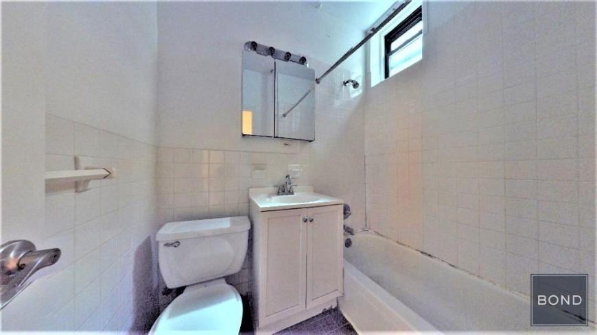 228 E 36th St - Photo 4 of 5