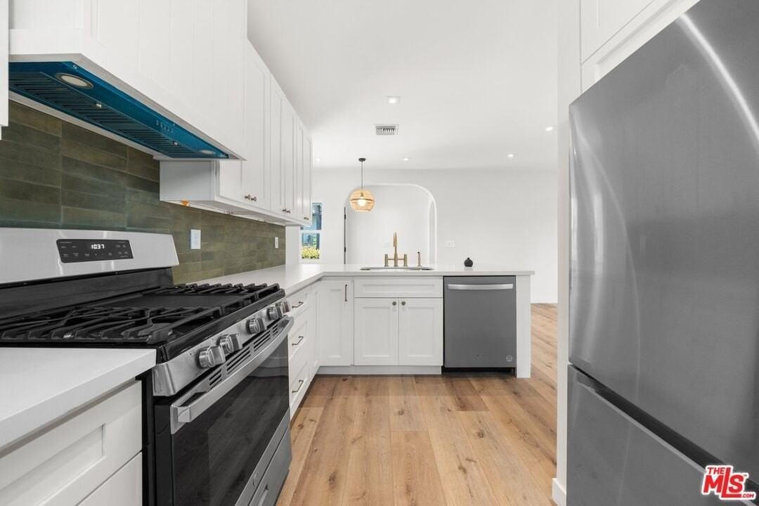 7418 Romaine St - Photo 5 of 21