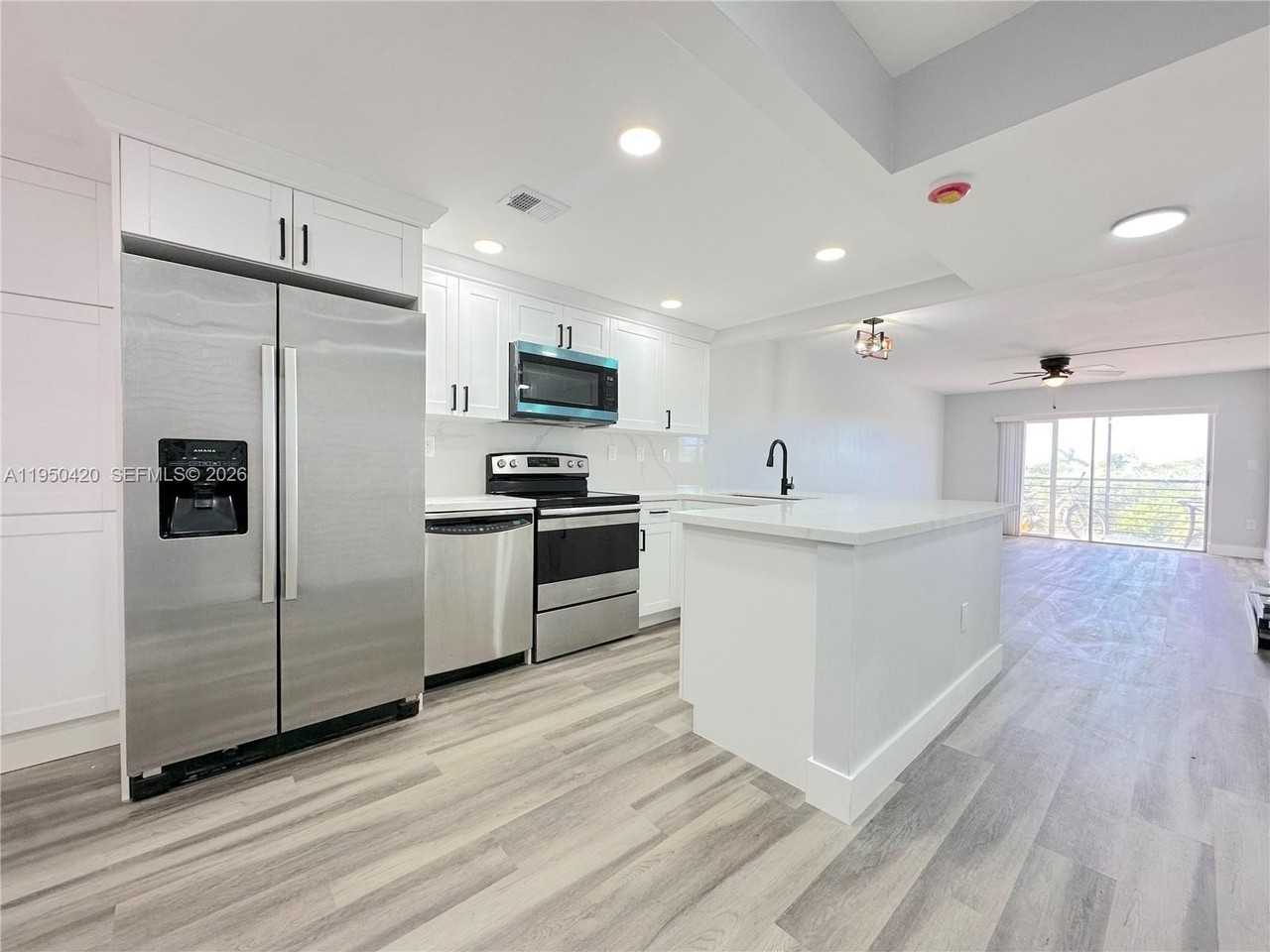 3110 N Pine Island Rd #408 - Photo 5 of 18