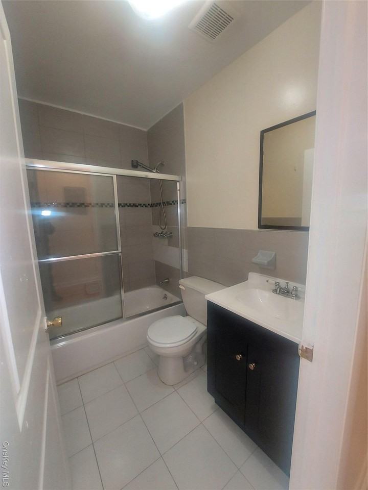 1123 Schenectady Ave - Photo 7 of 13