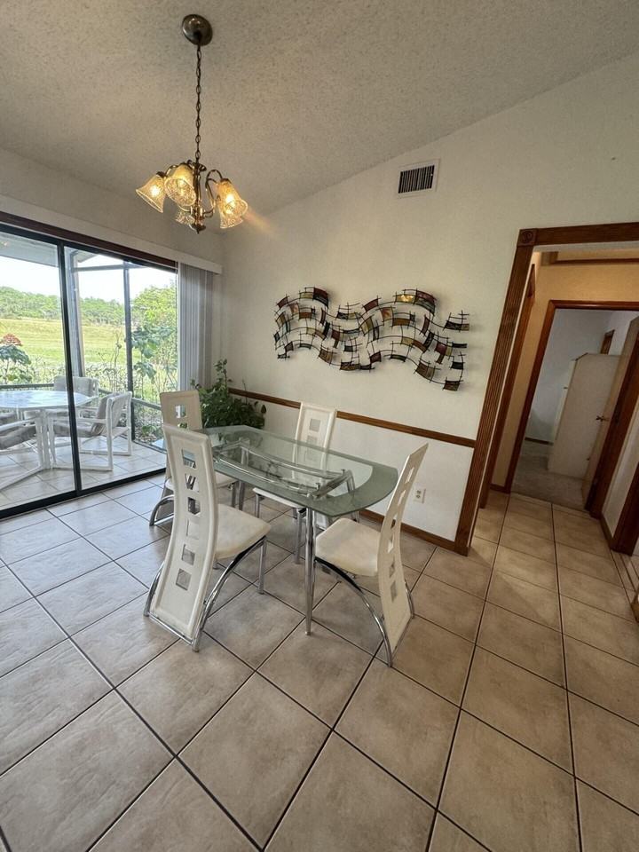 6774 Nw Abigail Ave - Photo 4 of 17