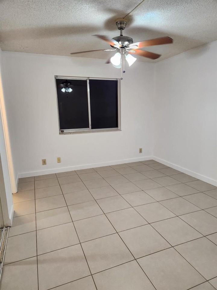 511 Gardens Dr #104 - Photo 6 of 8