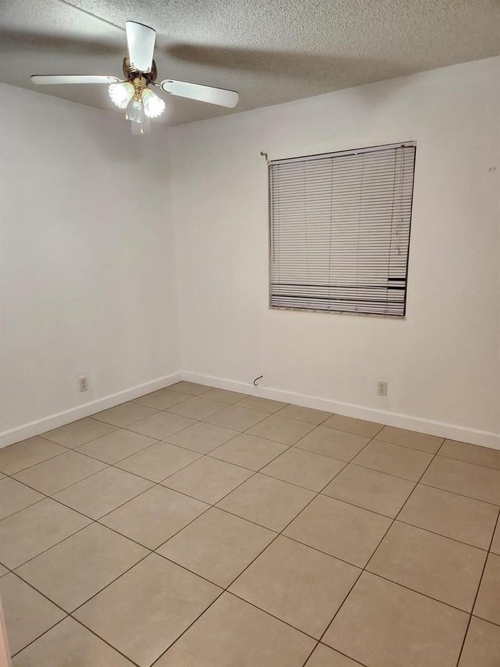 511 Gardens Dr #104 - Photo 7 of 8