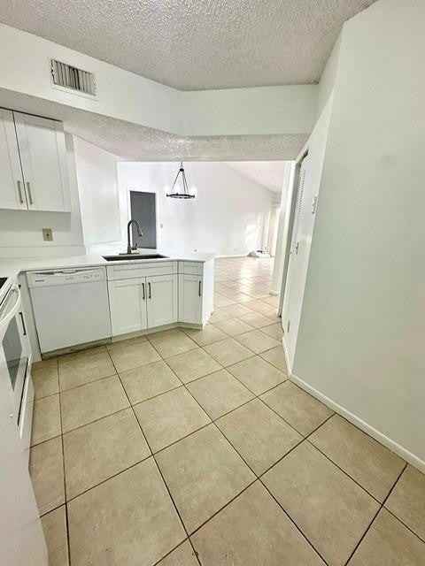 9033 Wiles Rd - Photo 4 of 12