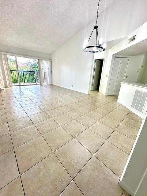 9033 Wiles Rd - Photo 6 of 12