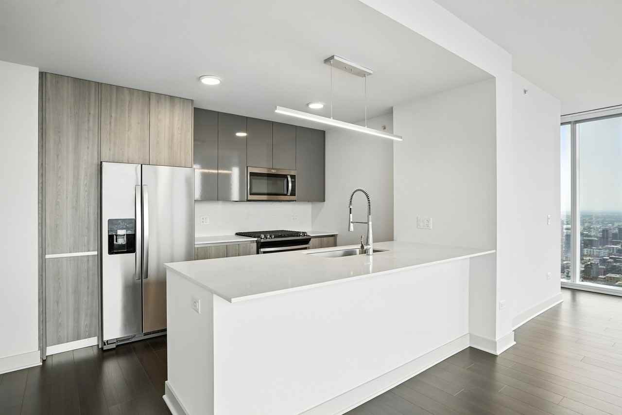 313 W Wolf Point Plz #1-2DEN - Photo 4 of 33