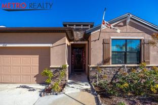 6545 Northwest Oaklawn Way - Photo 1 of 1