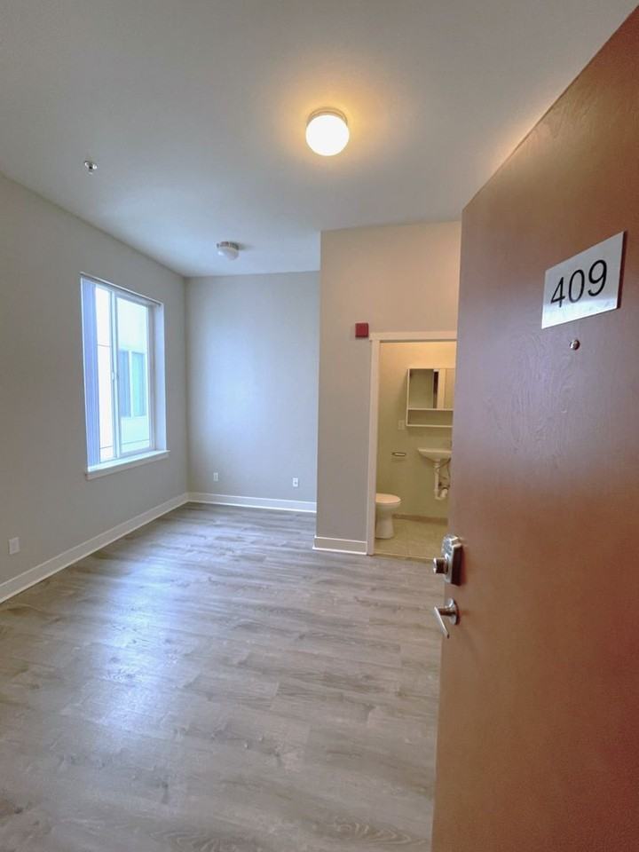 The Den Apartments - Photo 2 of 7