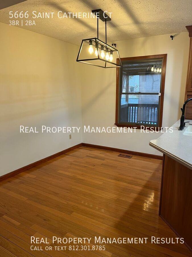 5666 Saint Catherine Ct - Photo 4 of 23