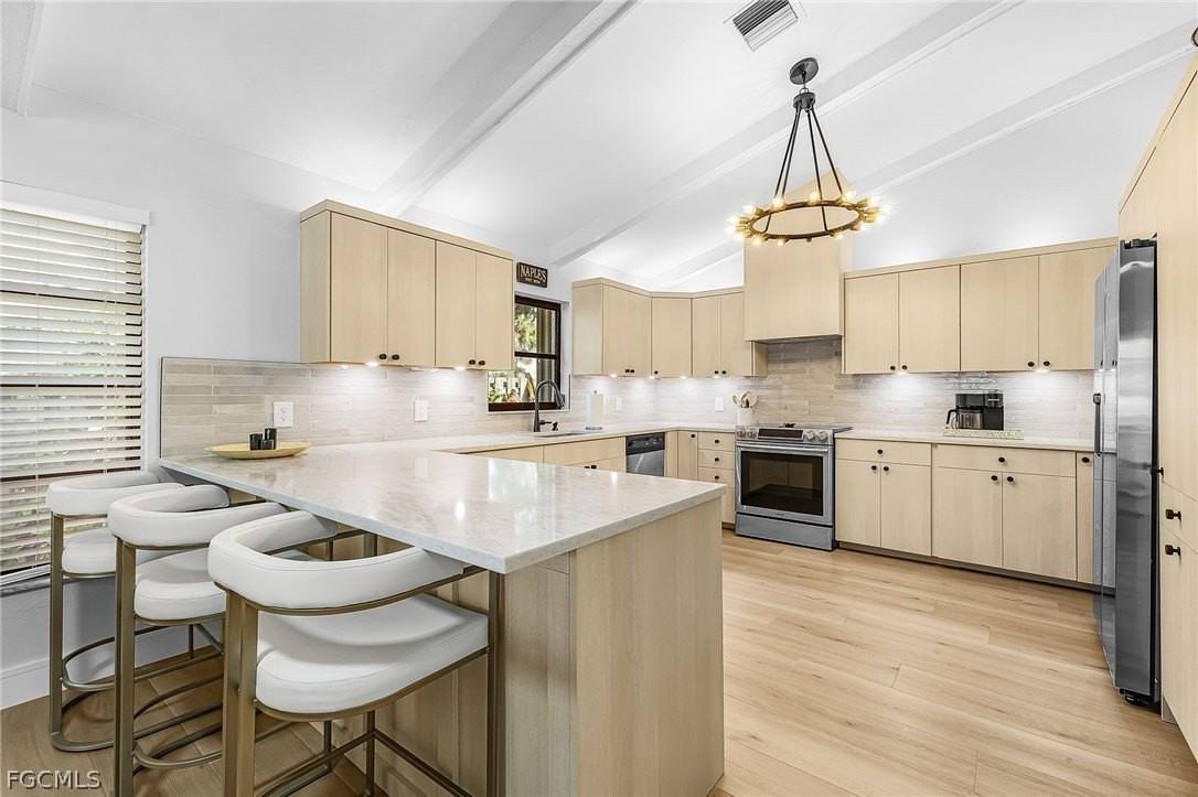 663 110th Ave N - Photo 5 of 34