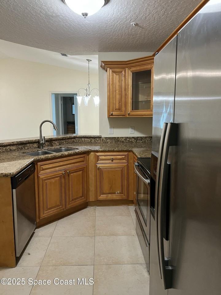 7667 N Wickham Rd Apt 724 #724 - Photo 2 of 15