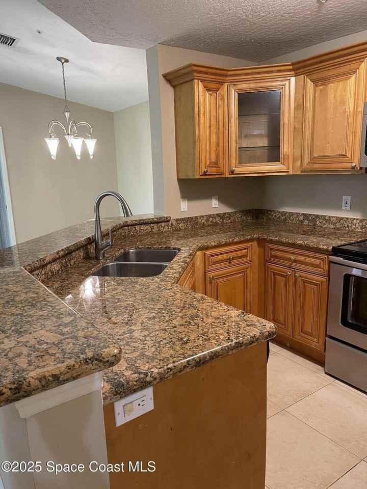 7667 N Wickham Rd Apt 724 #724 - Photo 5 of 15