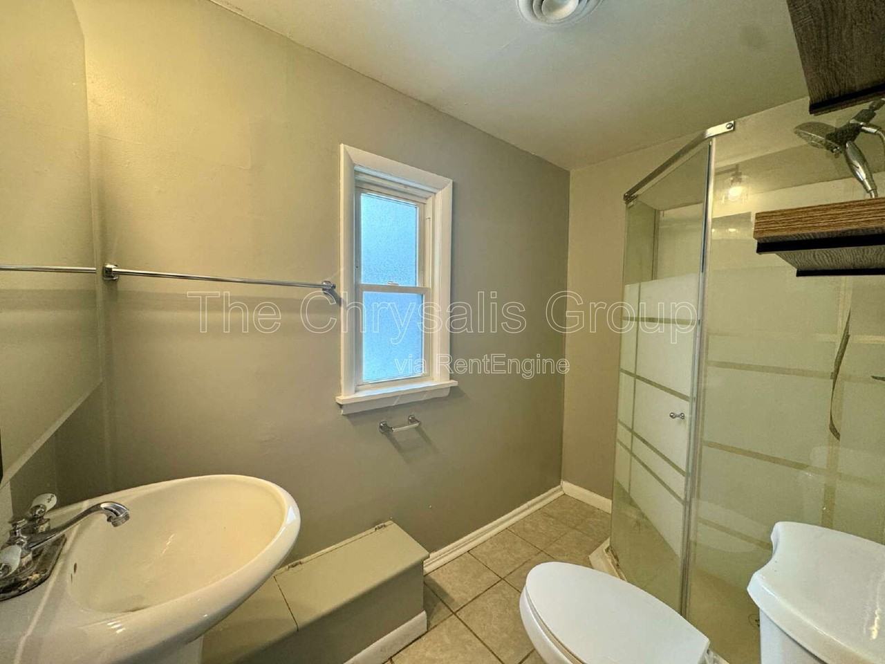 124 W 3rd St - Photo 3 of 8