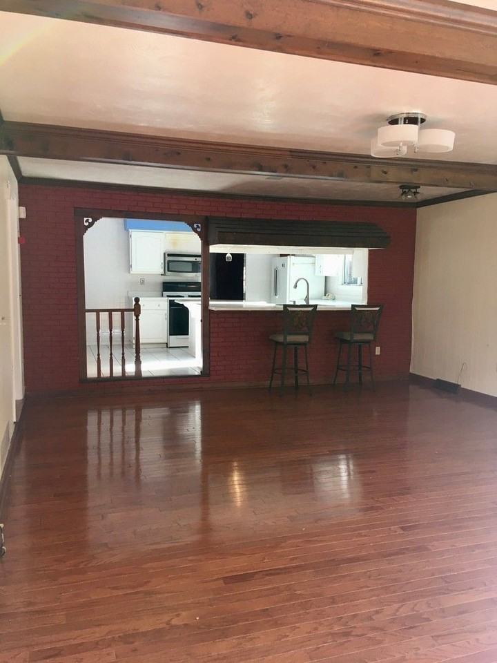 7009 Church St - Photo 3 of 18