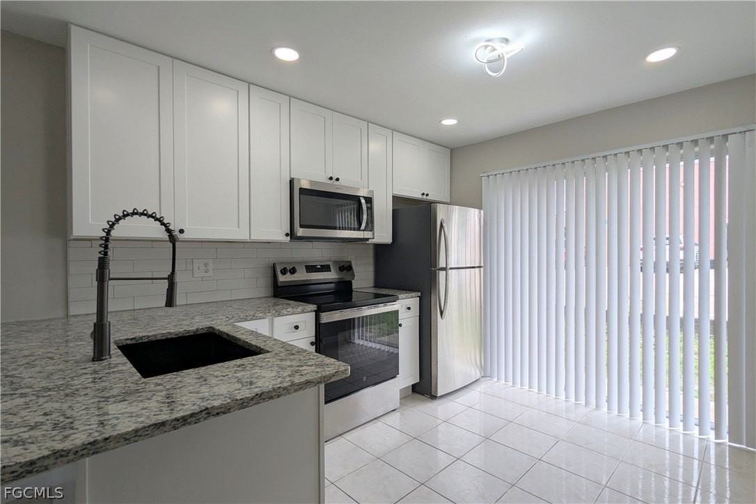 427 Ne Pine Island Ln #2 - Photo 7 of 15