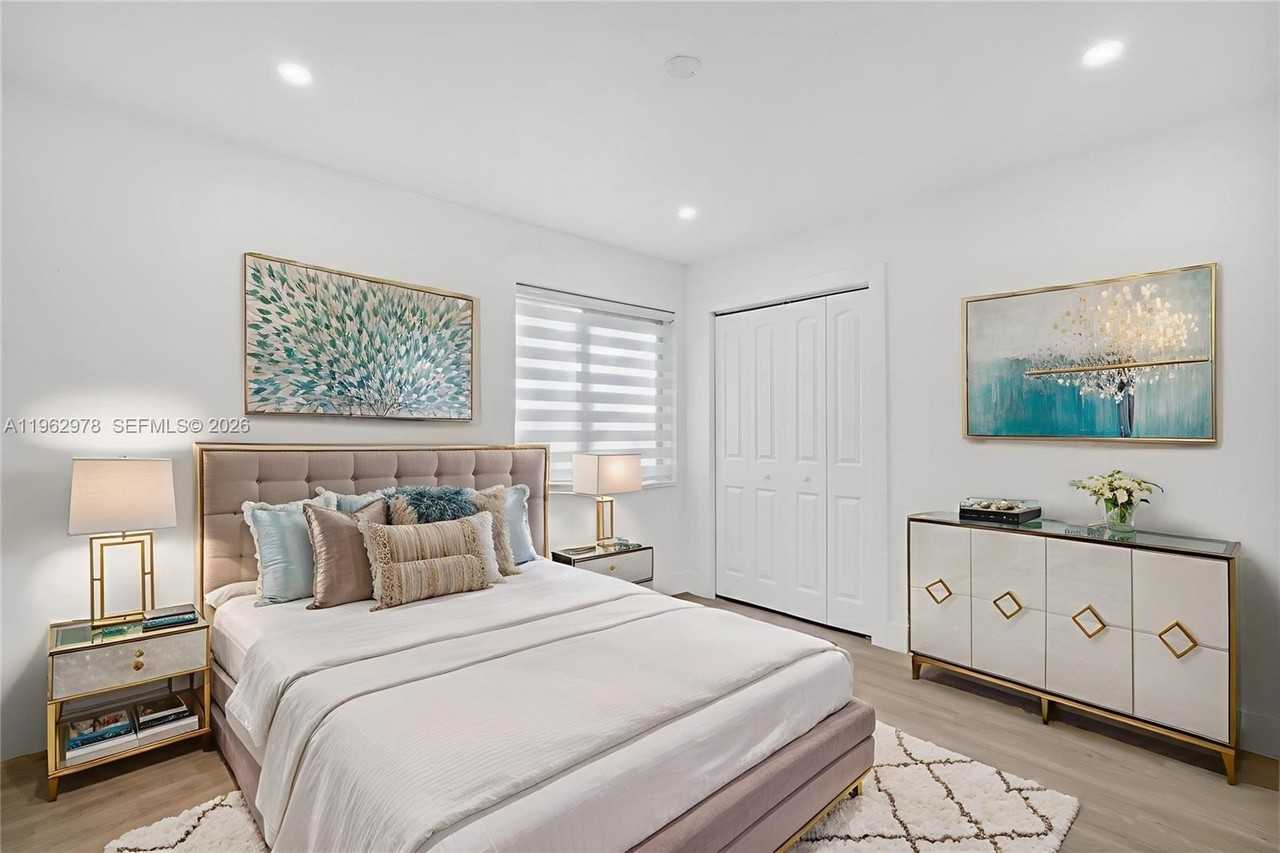 7501 Raleigh St - Photo 7 of 21